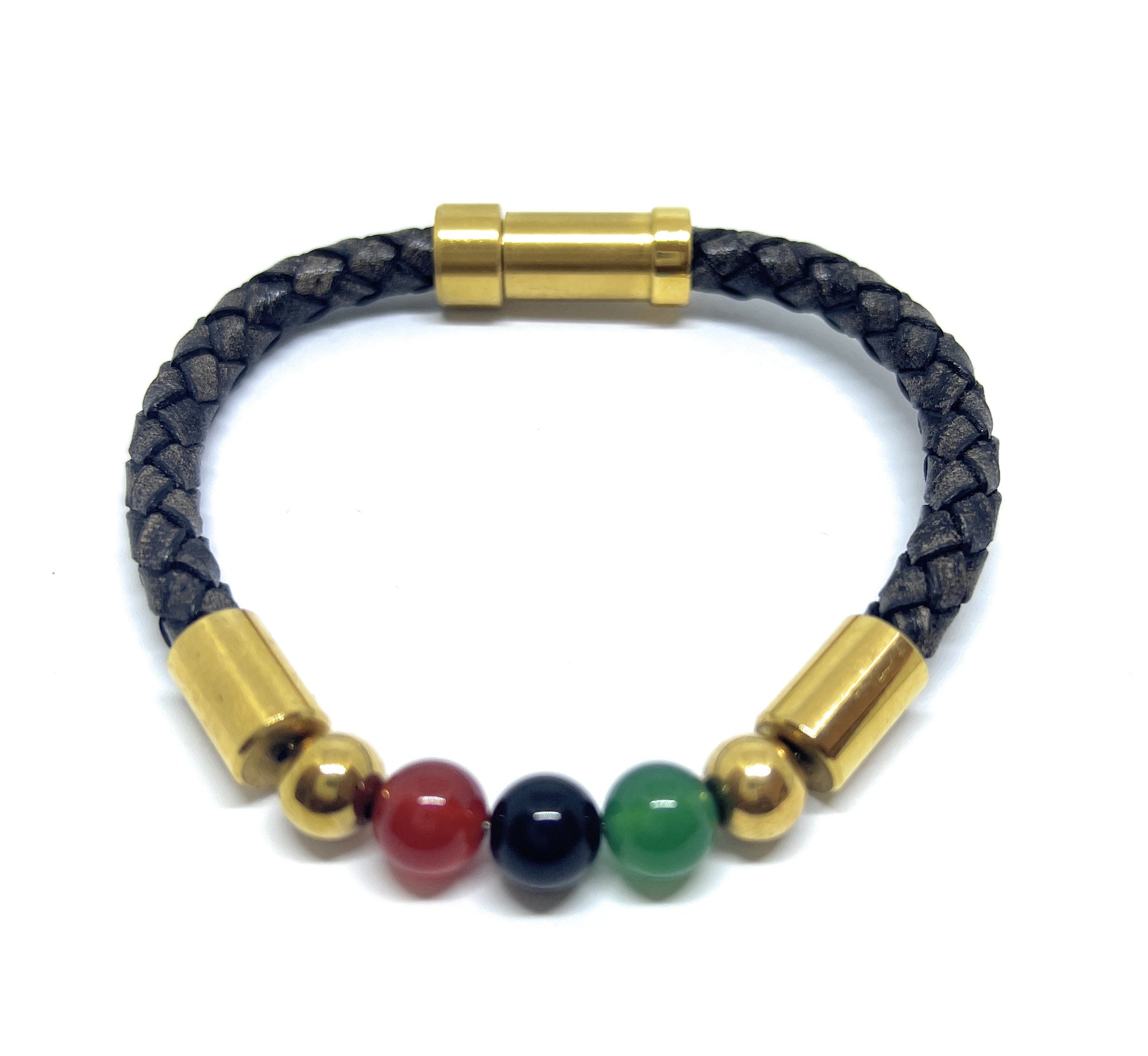Bracelet with gold cylindrical clasps and colorful beads on a white background